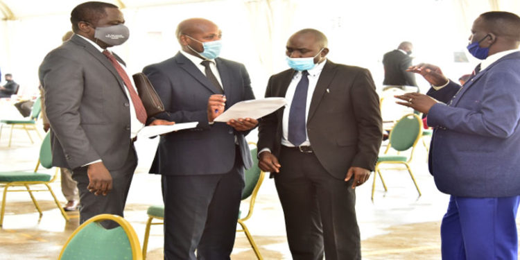 Legislators consulting before commencement of the Wednesday, 23 September 2020 plenary. The House has given the Attorney General and Electoral Commission a tight deadline to resolve the name saga ahead of the 2021 general elections