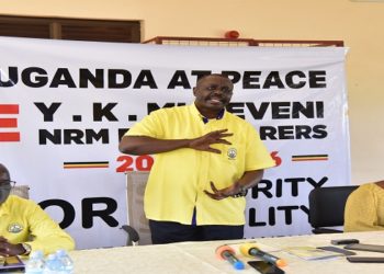 Oulanyah (C) address the youth at the meeting in Lira