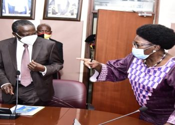 Kadaga (R) with the Finance Minister, Matia Kasaija after the meeting