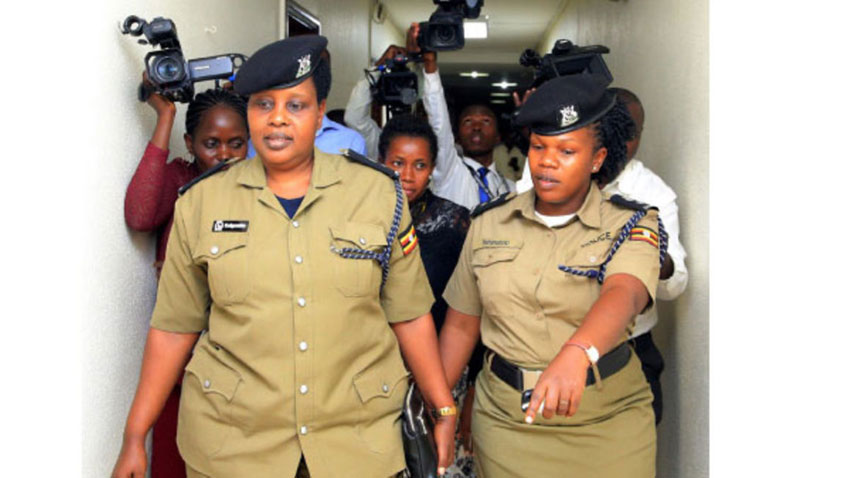 Superintendent of Police in charge of Police Mineral Protection Unit Jessica Keigomba (left) being escorted out of Parliament last year after being quizzed by MPs