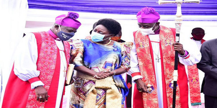 The Speaker(C) with Archibisop Kazimba(R) and Bishop Naimanhye at Kyando