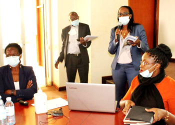 L-R: The Research Team; Dr. Rosemary Emegu Isoto (PI), Prof. Bernard Bashaasha (Co-PI and Principal, CAES), Ms. Caroline Kamugira and Ms. Noreen Munabi Nkuraija engage with stakeholders during the dissemination on 14th October 2020, Conference Hall, SFTNB, CAES, Makerere University, Kampala Uganda.