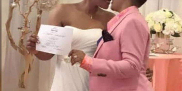 Julie Mutesasira with her female lover on their wedding day