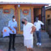 Rajiv Ruparelia inspects one of the eco toilets in Kamwokya