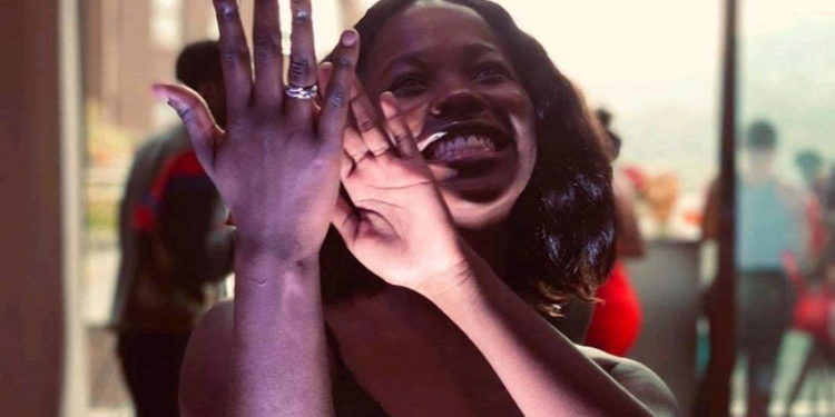 Princess Ssangalyambogo putting on her ring