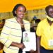 Musherure stands alongside NRM Electoral Commission boss Tanga Odoi