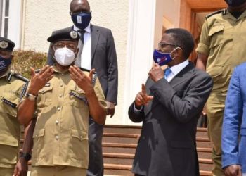 Police Chief Political Commissar AIGP Asan Kasingye with Buganda Kingdom Premier Charles Peter Mayiga