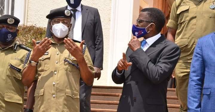 Police Chief Political Commissar AIGP Asan Kasingye with Buganda Kingdom Premier Charles Peter Mayiga