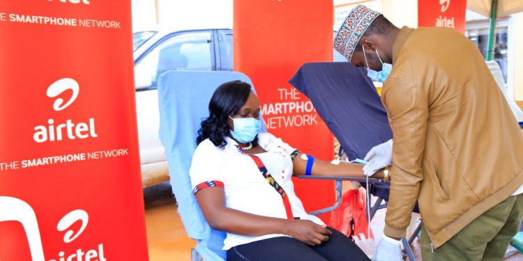 Airtel Uganda, the Customer Service Director Miss Lyndah Nabayinda donating blood at one of the centres