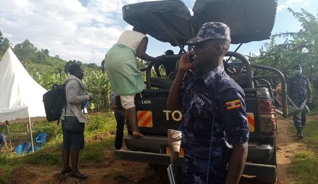 The deceased's body being taken to the mortuary for postmortem