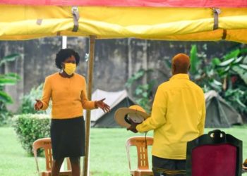 President Yoweri Museveni with Investment Minister Evelyn Anite