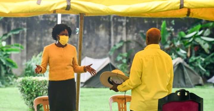 President Yoweri Museveni with Investment Minister Evelyn Anite