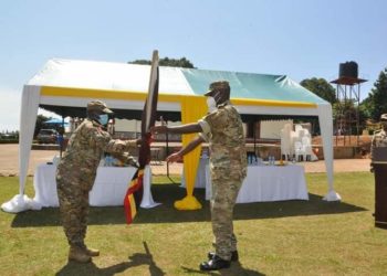 Maj Gen James Birungi handing over the SFC mantle to Lt Gen Muhoozi Kainerugaba