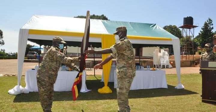 Maj Gen James Birungi handing over the SFC mantle to Lt Gen Muhoozi Kainerugaba