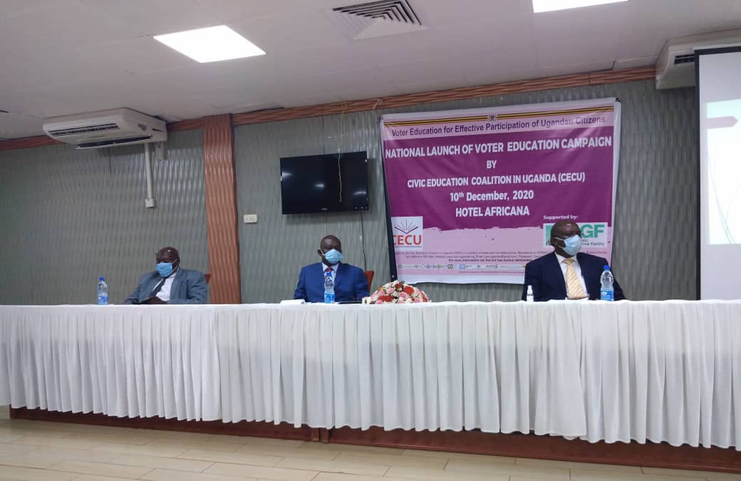 L-R: CECU's Odauk Paul, EC Secretary Leonald Mulekwa and CECU Chairperson JJ Bakalikwira during the launch of the National Voter Education campaign on Thursday