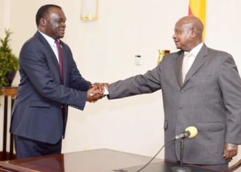 Chief Justice Owiny Dollo and President Yoweri Museveni