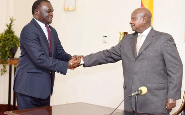 Chief Justice Owiny Dollo and President Yoweri Museveni