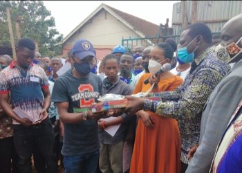 One of the beneficiaries receiving his DIT certificate and start equipment on Friday