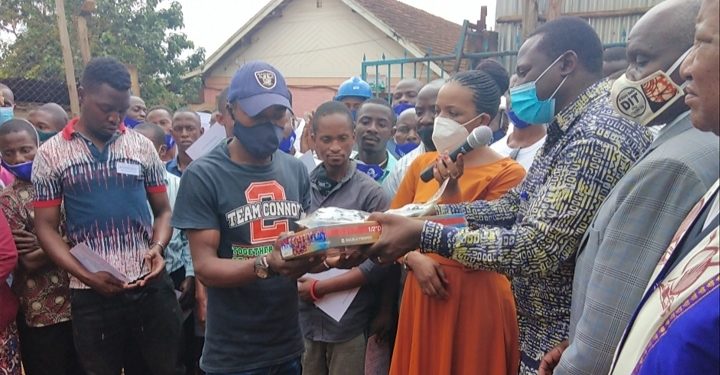 One of the beneficiaries receiving his DIT certificate and start equipment on Friday