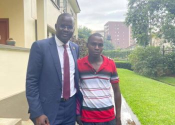 Nicholas Opiyo with Tumusiime