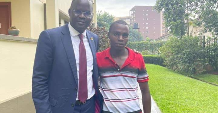 Nicholas Opiyo with Tumusiime