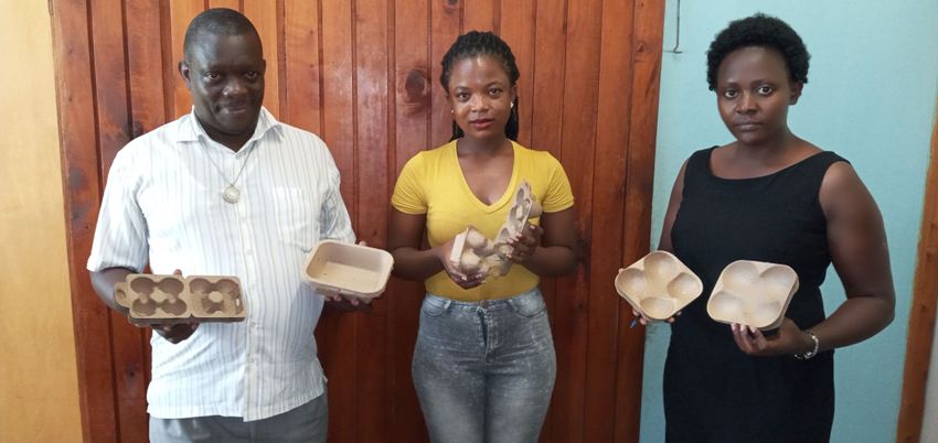 The team from Makerere University with samples of the Stoverpack packaging, from left, Dr. Stephen Lwasa, Leticia Katiiti and Grace Mbabazi