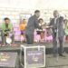 Pastor Bugembe receiving Shs10m from VP Ssekandi