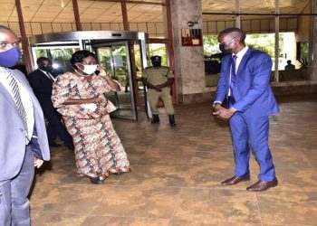 Speaker Kadaga (2nd L) arrives at the Imperial Royale Hotel for the conference