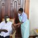 VP Ssekandi receiving his Covid-19 vaccine jab