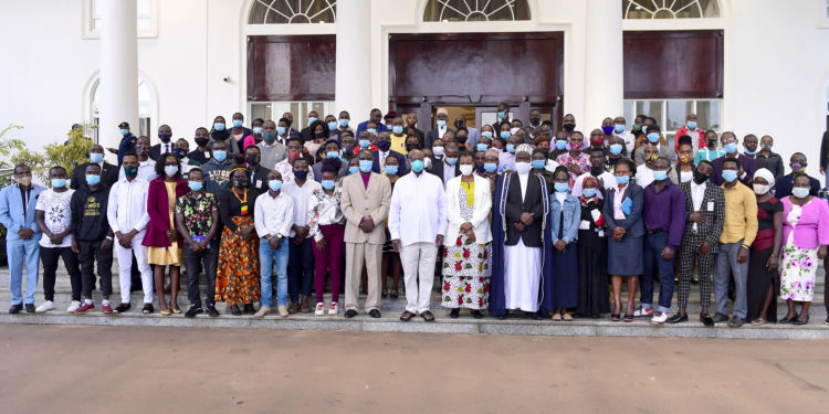 President Yoweri Kaguta Museveni together with the First Lady Janet Musevenei at the ceremony of the Disgruntled Youth Program organised by the Inter Religious Council of Uganda and the   Launch of the First Demostration Farm located in Buikwe. They posed for a group photograph after the ceremony at State House in Entebbe in 30th March 2021.