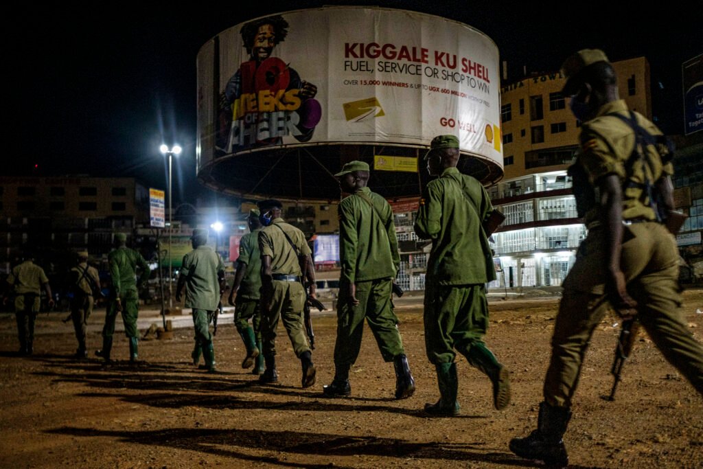 Security officers during night curfew patrol