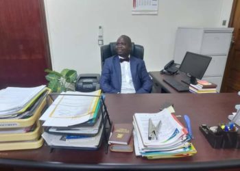 Chris Obore in his office at Parliament