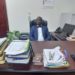 Chris Obore in his office at Parliament