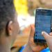 A smartphone user in Uganda