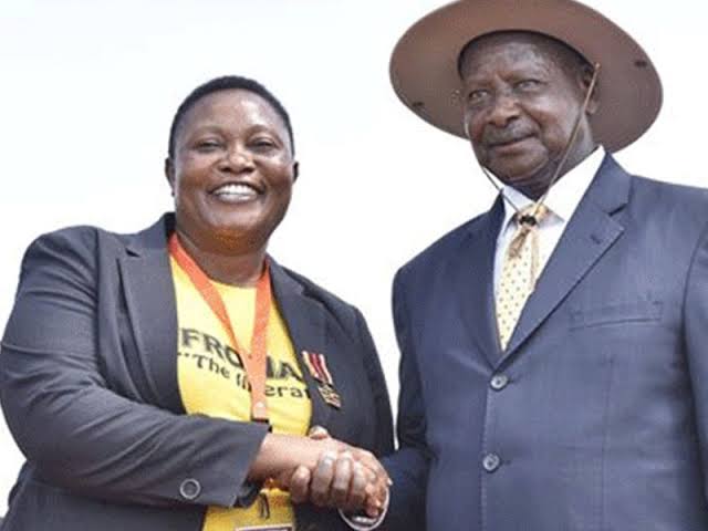 Minister Milly Babalanda with President Museveni