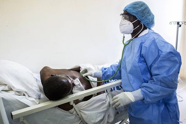 A doctor treating a patient