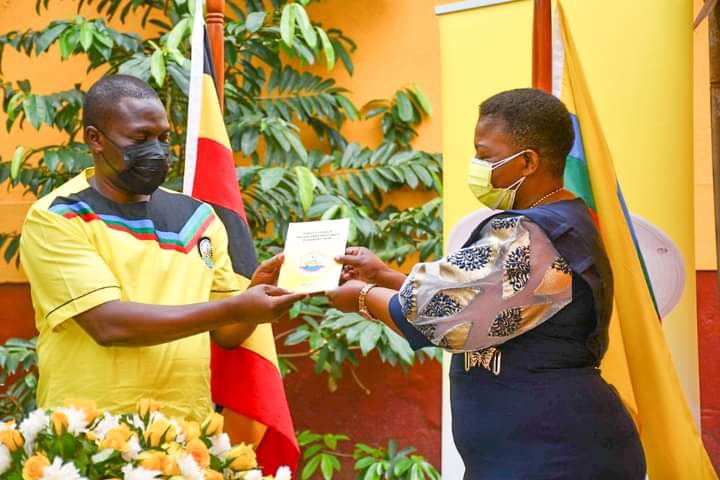Kasule Lumumba handing over office to Richard Todwong