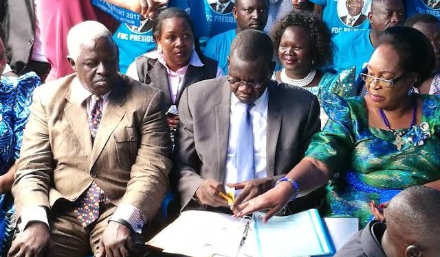 FDC national chairperson Wasswa Biriggwa, FDC president Patrick Amuriat and Joyce Ssebugwawo