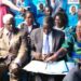 FDC national chairperson Wasswa Biriggwa, FDC president Patrick Amuriat and Joyce Ssebugwawo