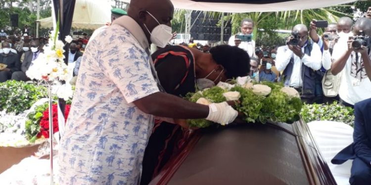 Gen Katumba and wife Catherine during the burial of their daughter Brenda on Thursday