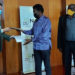 Security Minister Jiim Muhwezi after inking deal with Russian company on Friday