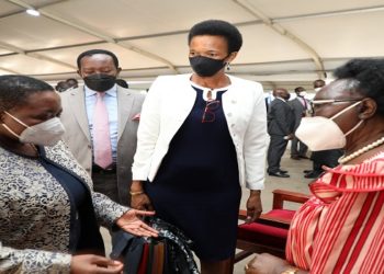 The Prime Minister, Hon Robinah Nabanja interacts with Hon Cecilia Ogwal(R) as Hon Esther Anyakun(C) looks on