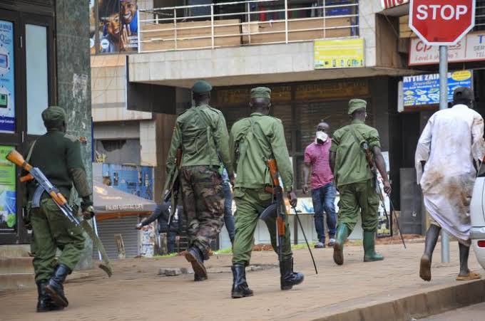 Security officers enforcing Covid-19 directives in Kampala