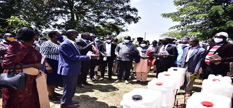 MPs on the team attend an event to distribute handwashing equipment in Namayingo