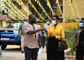 NRM SG Richard Todwong and Rosemary Sseninde at the party headquarters in Kampala on Thursday