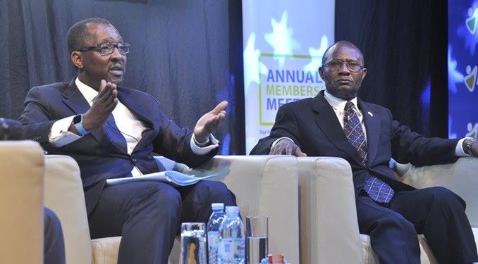 Richard Byarugaba (L) the NSSF Managing Director with Patrick Byabakama Kaberenge the Board Chairman.