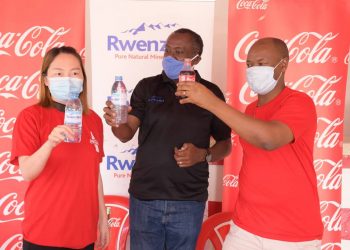 Jackie Gong Younting, a Director at FengHuang, Coca-Cola Beverages Africa Public Affairs & Communications Director, Simon Kaheru and Samuel Kangave, PRI Manager during the MoU signing.