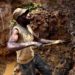 One of few remaining miners digs out soil which will later be filtered for traces of cassiterite, the major ore of tin, at Nyabibwe mine, in eastern Congo, Aug. 7, 2012.