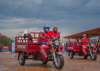 Winners test driving the Tuk-Tuks at Coca-Cola Namanve