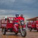 Winners test driving the Tuk-Tuks at Coca-Cola Namanve